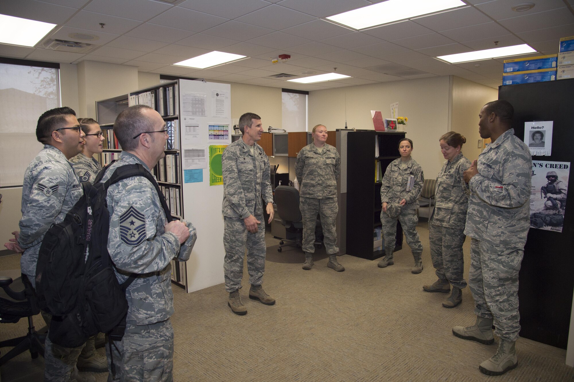 Members of the 23d Medical Group Bioenvironmental Engineering Flight give a briefing about their occupation to Col. Thomas Kunkel, 23d Wing commander, during a commander’s immersion tour, Dec. 12, 2016, at Moody Air Force Base, Ga. The immersion was a way to inform the commander of the many resources the flight provides. (U.S. Air Force photo by Staff Sgt. Eric Summers Jr.)