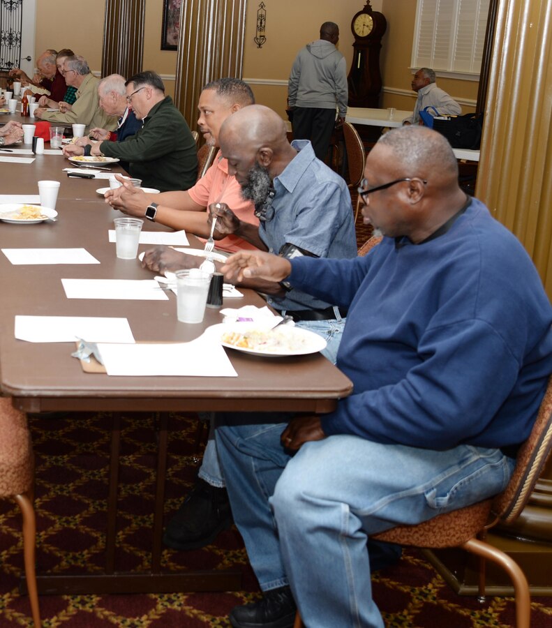Dozens of active-duty, retirees, veterans as well as civilians listen as guest speaker, Julie Robbins, natural resources manager, Marine Corps Logistics Base Albany, recaps decades of the base’s history at the installation’s Veterans Breakfast, recently. The monthly event, which was held at the Town and Country’s Grand Ballroom, features guest speakers, who share relevant information with attendees on various topics and points of interest to the military community.
