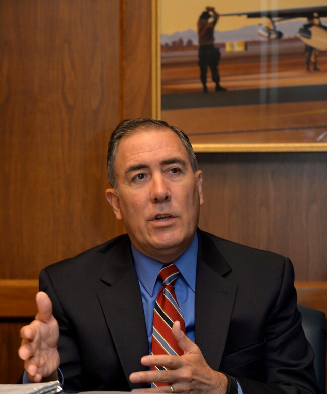 Roberto Guerrero, the Deputy Assistant Secretary of the Air Force for Operational Energy, discusses the part Vance Air Force Base, Oklahoma, plays in producing an energy-aware culture. Team Vance teaches student pilots how to shave more than 6 percent off their fuel consumption on cross-country sorties and 3 percent on local flights. (U.S. Air Force photo/ Mark Harrell)