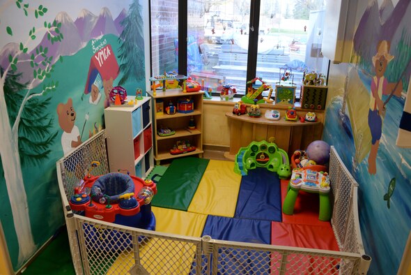 A toddler themed play area offering a variety of toys and activities is one of many options for children attending the Teddy’s Child Watch facility inside USAF David Grant Medical Center at Travis Air Force Base, Calif. The facility offers military families attending medical appointments at DGMC with free childcare. (U.S. Air Force photo/Tech. Sgt. James Hodgman)