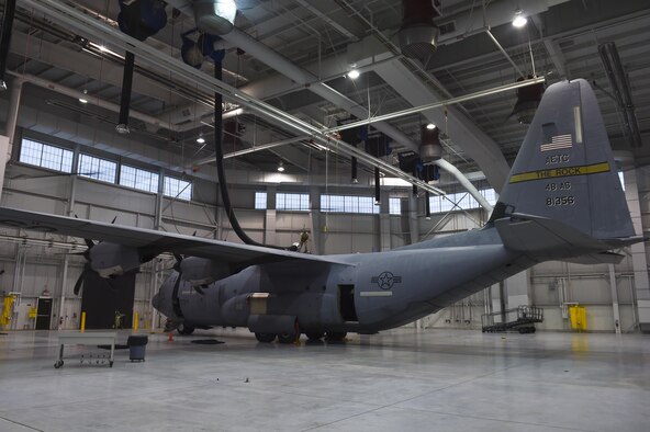 A U.S. Air Force Airman from the 19th Maintenance Squadron fuel systems repair flight, prepares to inspect the right wing fuel cell of a C-130J Dec. 5, 2016, in Hangar 232 on at Little Rock Air Force Base, Ark. 19th MXS fuel systems repair Airmen work 24/7 on more than 58 aircraft to keep the fleet ready to fly. (U.S. Air Force photo/Senior Airman Harry Brexel)