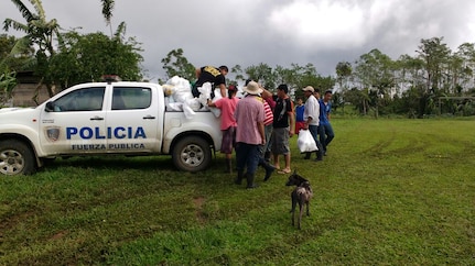 Costa Rican police bring supplies to areas of the country damaged during Hurricane Otto which hit the county Nov. 26. Joint Task Force Bravo in Soto Cato Air Base, Honduras sent two personnel to assist the Costa Rican country team and other emergency response organizations to identify engineer requirements and humanitarian assistance projects. 
