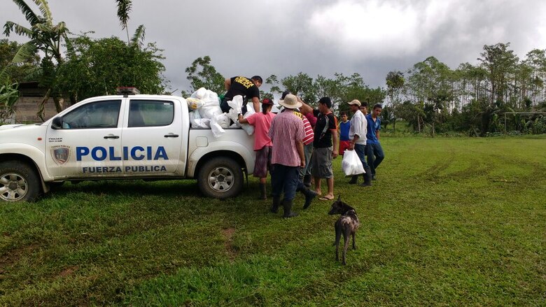 Costa Rican police bring supplies to areas of the country damaged during Hurricane Otto which hit the county Nov. 26. Joint Task Force Bravo in Soto Cato Air Base, Honduras sent two personnel to assist the Costa Rican country team and other emergency response organizations to identify engineer requirements and humanitarian assistance projects. 