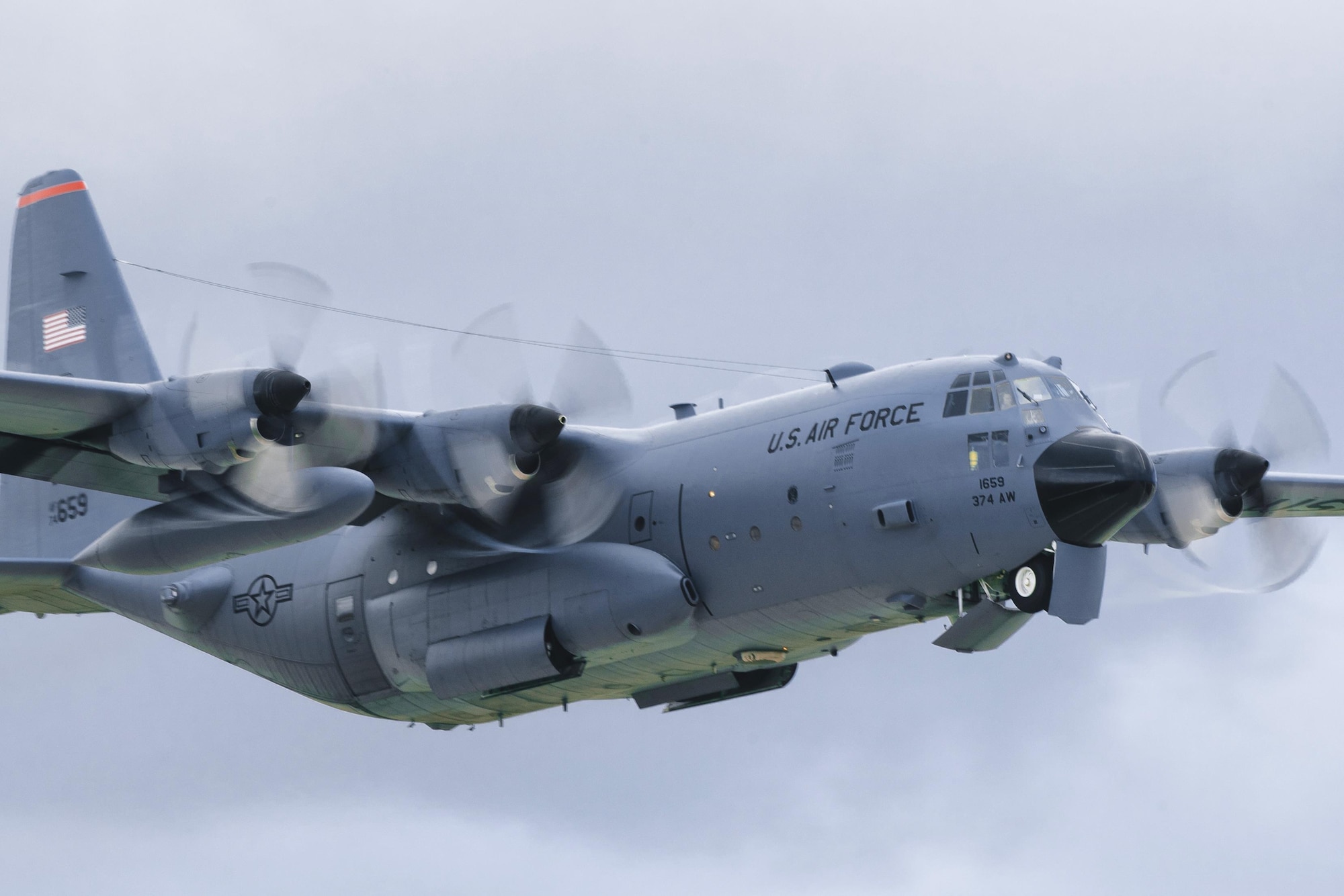 A C-130 Hercules takes off during Operation Christmas Drop at Andersen Air Force base, Guam, Dec. 7, 2016. Operation Christmas Drop is the Department of Defense's longest running humanitarian mission covering 56 remote islands in Micronesia. (U.S. Air Force photo by Senior Airman Delano Scott/Released)