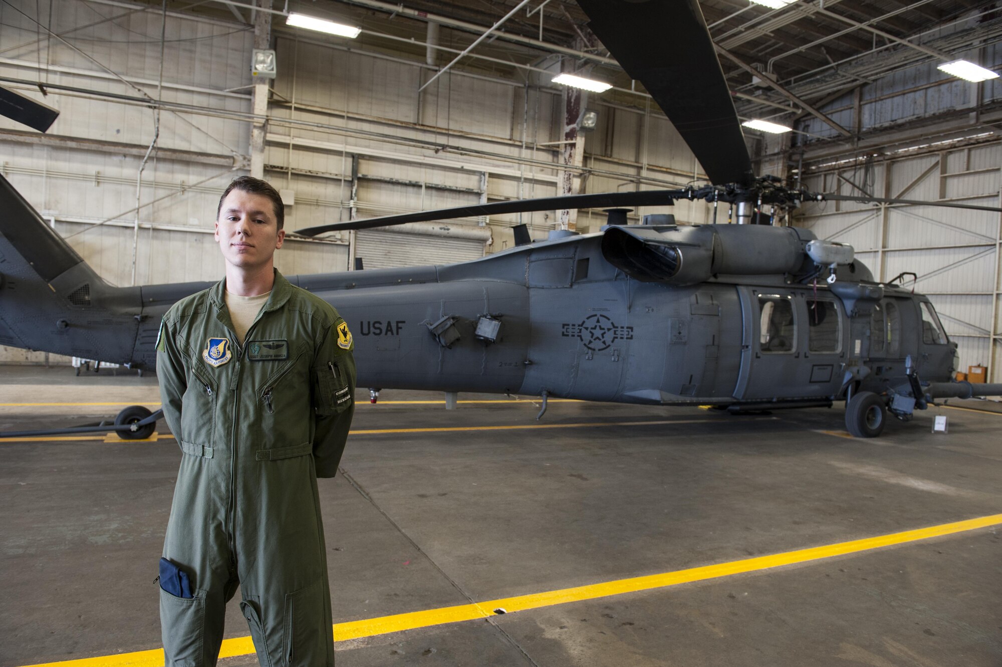 U.S. Air Force Staff Sgt. Joseph Arriza is a special mission aviator instructor for the 33rd Rescue Squadron. He participated in the rescue of five Marines alongside other members of the 33rd RQS, 31st RQS, Japan Air Self-Defense Force and the Japan Coast Guard Dec. 13, 2016. The Marines, assigned to Marine Aircraft Group 36, 1st Marine Aircraft Wing, had conducted a shallow water landing off the coast of Okinawa near Camp Schwab in an MV-22 Osprey. (U.S. Air Force photo by Senior Airman Lynette M. Rolen/Released)
