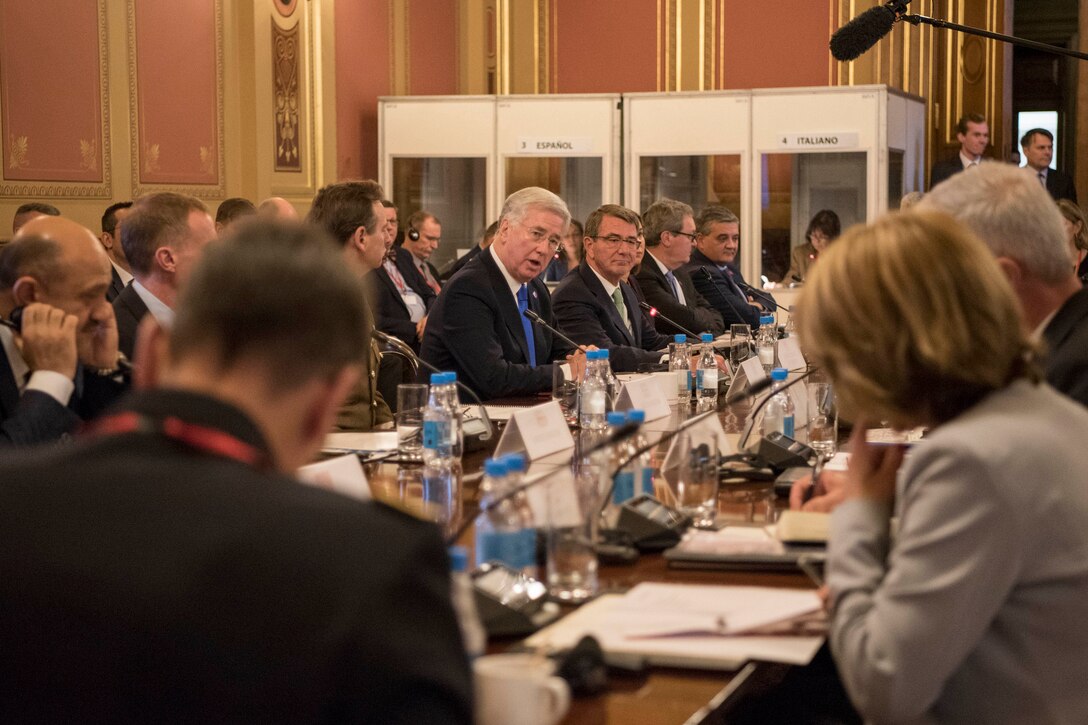 Defense Secretary Ash Carter listens as his British counterpart speaks a counter-Islamic State of Iraq and the Levant ministerial conference in London, Dec. 15, 2016. DoD photo by Air Force Tech. Sgt. Brigitte N. Brantley