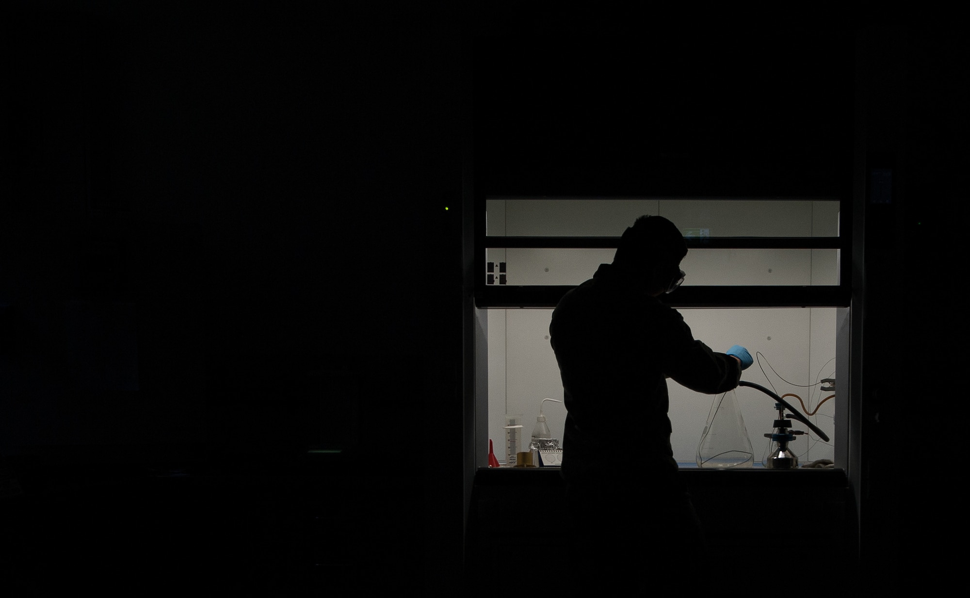 Airman 1st Class Phillip Nguyen, 86th Logistics Readiness Squadron fuels laboratory technician, samples and analyzes fuel at Ramstein Air Base, Germany, Dec. 12, 2016. It is the job of fuels specialists to manage every aspect of the refueling for every aircraft on the flightline, from the time they obtain the fuel to the moment it’s pumped in the planes. (U.S. Air Force photo by Airman 1st Class Lane T. Plummer)