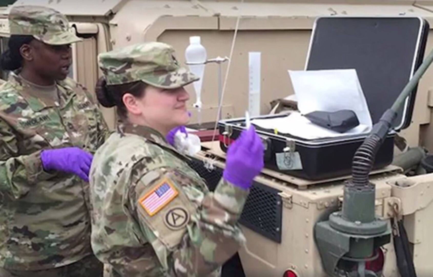 Defense Logistics Agency Energy Europe and Africa laboratory's noncommissioned officer Army Sgt. 1st Class Mandy Jo Allen demonstrates proper fuel assurance techniques at a fuel training exercises in Europe. Photo by 21st Theater Sustainment Command