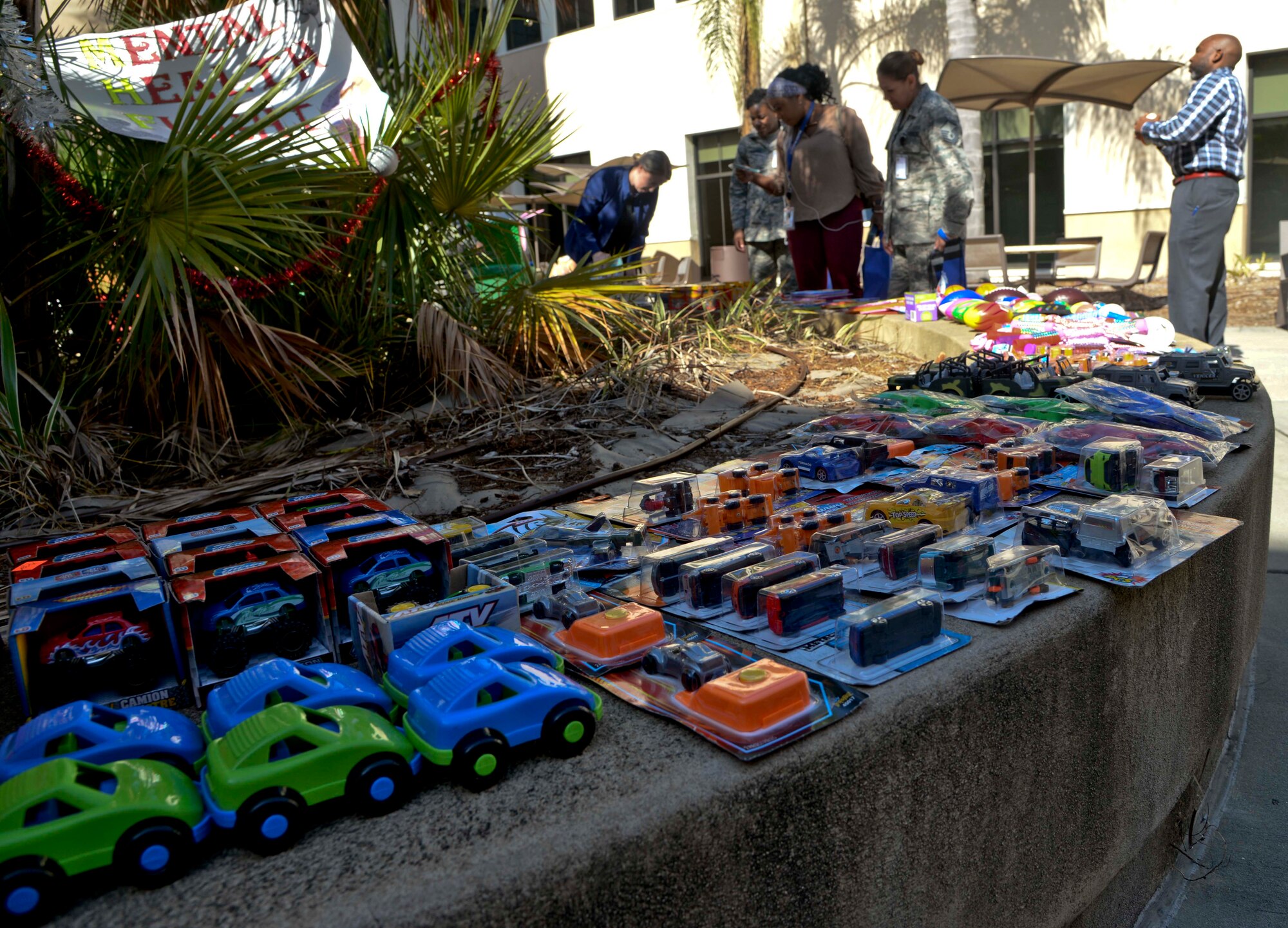 Toys lay on display during the 6th Medical Group (MDG) appreciation event at MacDill Air Force Base, Fla., Dec. 14, 2016. Free toys, crayons, reading and coloring books were offered to 6th MDG personnel to give to children as gifts for the holidays. (U.S. Air Force photo by Senior Airman Vernon L. Fowler Jr.)