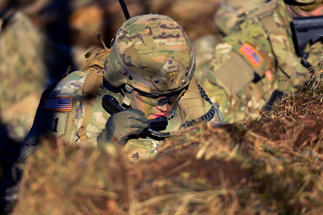 A soldier conducts a radio check during a live-fire exercise as part of Exercise Mountain Shock at Pocek Range in Slovenia, Dec. 9, 2016. The soldier is a paratrooper assigned to the 91st Cavalry Regiment, 173rd Airborne Brigade. Exercise Mountain Shock is an emergency response exercise with Solvenian soldiers focused on the rapid deployment and assembly of forces and team cohesion with weapon systems tactics and procedures. Army photo by Davide Dalla Massara