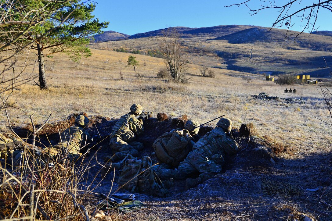 Soldiers prepare to engage targets during a live-fire exercise as part of Exercise Mountain Shock at Pocek Range in Slovenia, Dec. 9, 2016. Army photo by Davide Dalla Massara