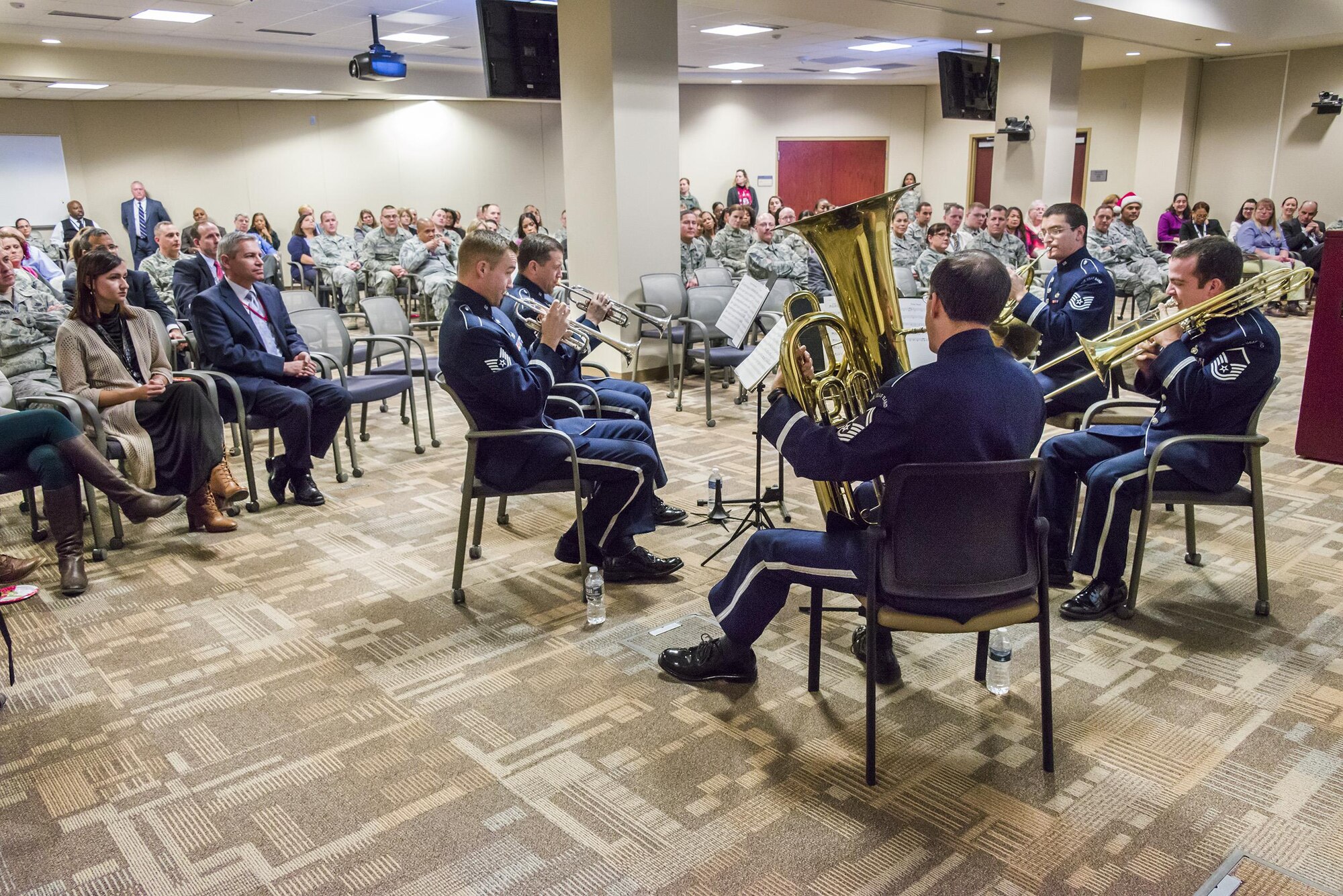 Tis the season for music courtesy of the U.S. Air Force Brass Quintet, shown as they perform holiday favorites Dec. 14 at the Russell Knox Building Collaboration Center, Marine Corps Base Quantico, Va. The ensemble of Air Force NCOs and Senior NCO's appeared at the invitation of the Air Force Office of Special Investigations headquarters. (U.S. Air Force photo/Michael Hastings)  