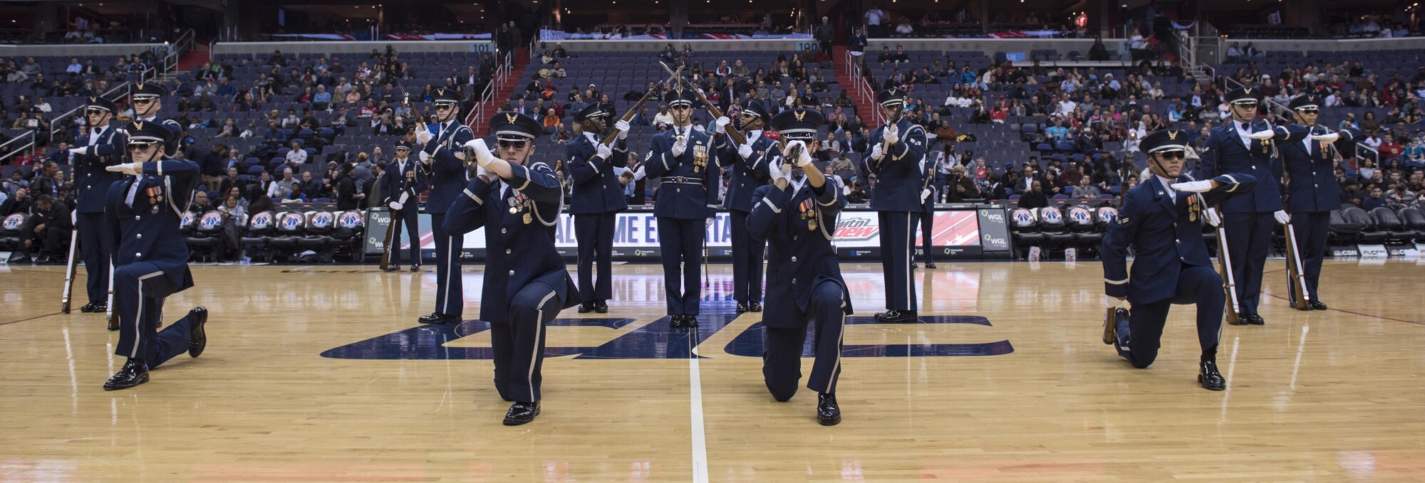The U.S. Air Force Honor Guard Drill Team performs during halftime at the Verizon Center in Washington, D.C., Dec. 14, 2016. The routine was part of the Washington Wizards’ Air Force night, where the team took on the Charlotte Hornets. (U.S. Air Force photo by Senior Airman Ryan J. Sonnier)