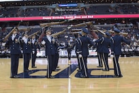 The U.S. Air Force Honor Guard Drill Team showcases a rifle maneuver during halftime at the Verizon Center in Washington, D.C., Dec. 14, 2016. The performance was part of the Washington Wizards’ Air Force night, where the team beat the Charlotte Hornets 109 -106. (U.S. Air Force photo by Senior Airman Ryan J. Sonnier)