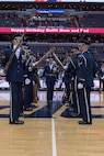 The U.S. Air Force Honor Guard Drill Team executes a drill maneuver during halftime at the Verizon Center in Washington, D.C., Dec. 13, 2016. The performance was part of the Washington Wizards’ Air Force night, where the team beat the Charlotte Hornets 109 -106. (U.S. Air Force photo by Senior Airman Ryan J. Sonnier)