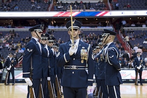 The U.S. Air Force Honor Guard Drill Team performs during halftime at the Verizon Center in Washington, D.C., Dec. 14, 2016. The routine was part of the Washington Wizards’ Air Force night, where the team took on the Charlotte Hornets. (U.S. Air Force photo by Senior Airman Ryan J. Sonnier)