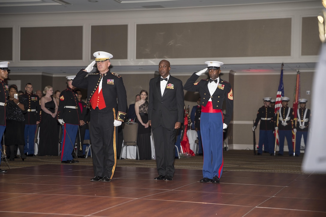 Marine Corps Recruiting Command (MCRC) Commanding General and Sergeant Major, U.S. Marine Corps Maj. Gen. Paul Kennedy, left, Sgt. Maj. Samuel Heyward Jr., right, and guest of honor, Sgt. Maj. Carlton M. Kent, ret., 16th Sergeant Major of the Marine Corps, render honors while the National Anthem is played during the MCRC 241st Marine Corps birthday ball at the Renaissance Hotel, Washington, D.C., Nov. 5, 2016. The ceremony is held annually to celebrate the tradition and history of the Marine Corps. (U.S. Marine Corps photo by Lance Cpl. Alexander Cockrell)