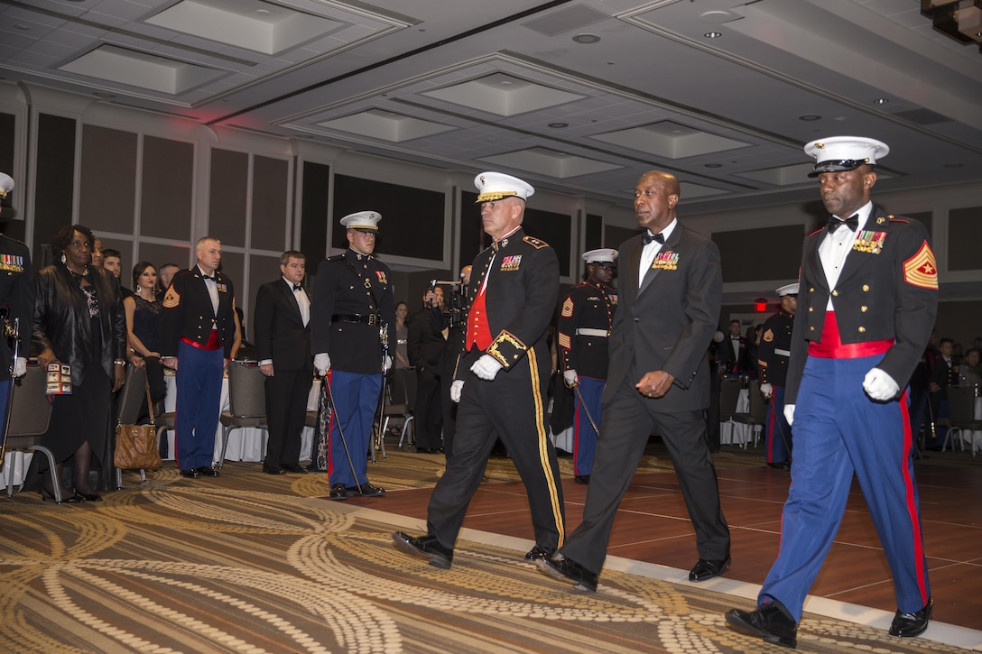 Marine Corps Recruiting Command (MCRC) Commanding General and Sergeant Major, U.S. Marine Corps Maj. Gen. Paul Kennedy, left, Sgt. Maj. Samuel Heyward Jr., right, and guest of honor, Sgt. Maj. Carlton M. Kent, ret., 16th Sergeant Major of the Marine Corps, march in as the official party during the MCRC 241st Marine Corps birthday ball at the Renaissance Hotel, Washington, D.C., Nov. 5, 2016. The ceremony is held annually to celebrate the tradition and history of the Marine Corps. (U.S. Marine Corps photo by Lance Cpl. Alexander Cockrell)