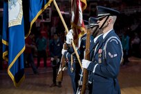Members of the U.S. Air Force Honor Guard post the colors during the Washington Wizards’ Air Force night at the Verizon Center in Washington, D.C., Dec. 14, 2016. The night also consisted of the U.S. Air Force Honor Guard Drill team performance during halftime. The Wizards beat the Charlotte Hornets 109 – 106. (U.S. Air Force photo by Senior Airman Ryan J. Sonnier)
