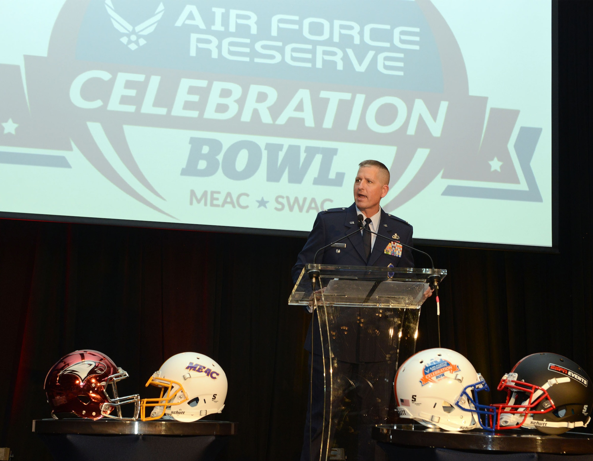 Col. Tim Martz, vice commander,Air Force Reserve Command Recruiting Service, givves a welcome speech to the Grambling State and North Carolina Central football teams at a dinner Wednesday night, welcoming teams to the 2016 Air Force Reseerve Celebration Bowl. Martz compared the Air Force coe values to those of the the teamrs and that each had shared values. He also congratulated the coaches and administrations of each school. He received a large applause when he told the teams that the game would be covered on the Armed Forces Network and told them how important it is to have a taste of home when deployed. The game kicks off at noon at the Gerogia Dome in Atlanta and will be aired on ABC. (Air Force photo/Master Sgt. Chance Babin)