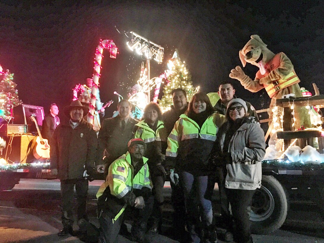 ESPAÑOLA, N.M. – Bobber the Water Safety Dog joined District staff from Abiquiu Lake as they got in the holiday spirit and participated in the annual Christmas Light Parade to promote water safety, Dec. 10, 2016. Park manager John Mueller said they had “500 direct contacts and spread an uncountable amount of water-safety related Christmas cheer!” 