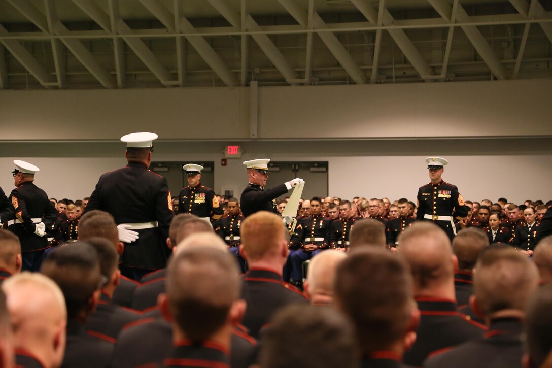 CWO2. Bennie A. Pettit, Marine Corps Detachment FLW, reads the 13th Commandant of the Marine Corps Birthday Message at Fort Leonard Wood, MO. November 10th, 2016. As the Adjutant, CWO2 Pettit is responsible for reminding the honorable service of the Corps, to all Marines throughout the globe, on the birthday of the Corps. (U.S. Marine Corps photo by Sgt. Teng Yang)