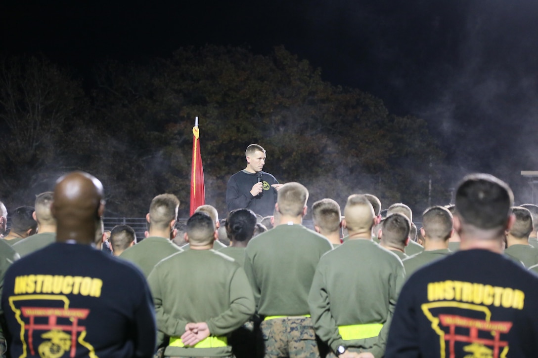 Col. George Markert, Commanding Officer, Marine Corps Detachment Fort Leonard Wood, briefs Marines after the run at Fort Leonard Wood, MO. Nov. 10, 2016. As the Commanding Officer, Col. Markert speaks about how critical each Military Occupational Specialties (MOS) impact the Marine Corps wide. (U.S. Marine Corps photo by Sgt. Teng Yang)