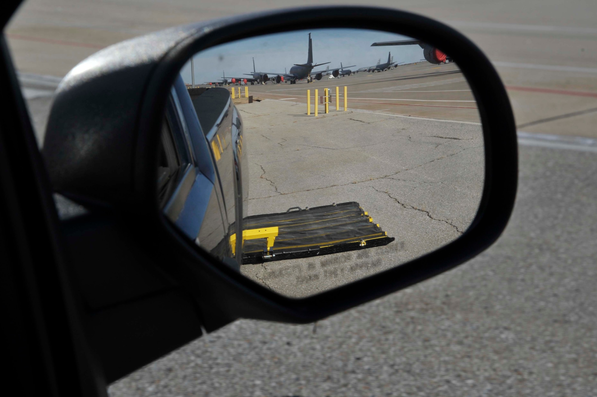 A dual FOD system is dragged behind a truck Dec. 2, 2016, at McConnell Air Force Base, Kan. The equipment, which is valued at approximately $11,000, was recently purchased to support the base’s FOD prevention program and can be operated by one person. (U.S. Air Force photo/Airman 1st Class Erin McClellan)
