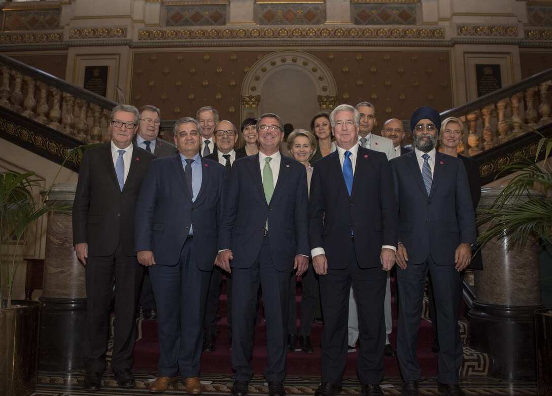 Defense Secretary Ash Carter poses for a group photo with fellow defense secretaries and ministers of defense in London during a meeting of defense ministers whose countries are participating in the campaign to counter the Islamic State of Iraq and the Levant, Dec. 15, 2016. DoD photo by Air Force Tech. Sgt. Brigitte N. Brantley