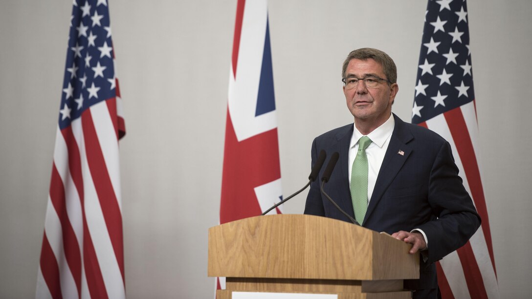 Defense Secretary Ash Carter speaks at a news conference with British Defense Secretary Michael Fallon following a counter-ISIL ministerial conference in London. Carter is wrapping up an around-the-world trip to advance DoD priorities.