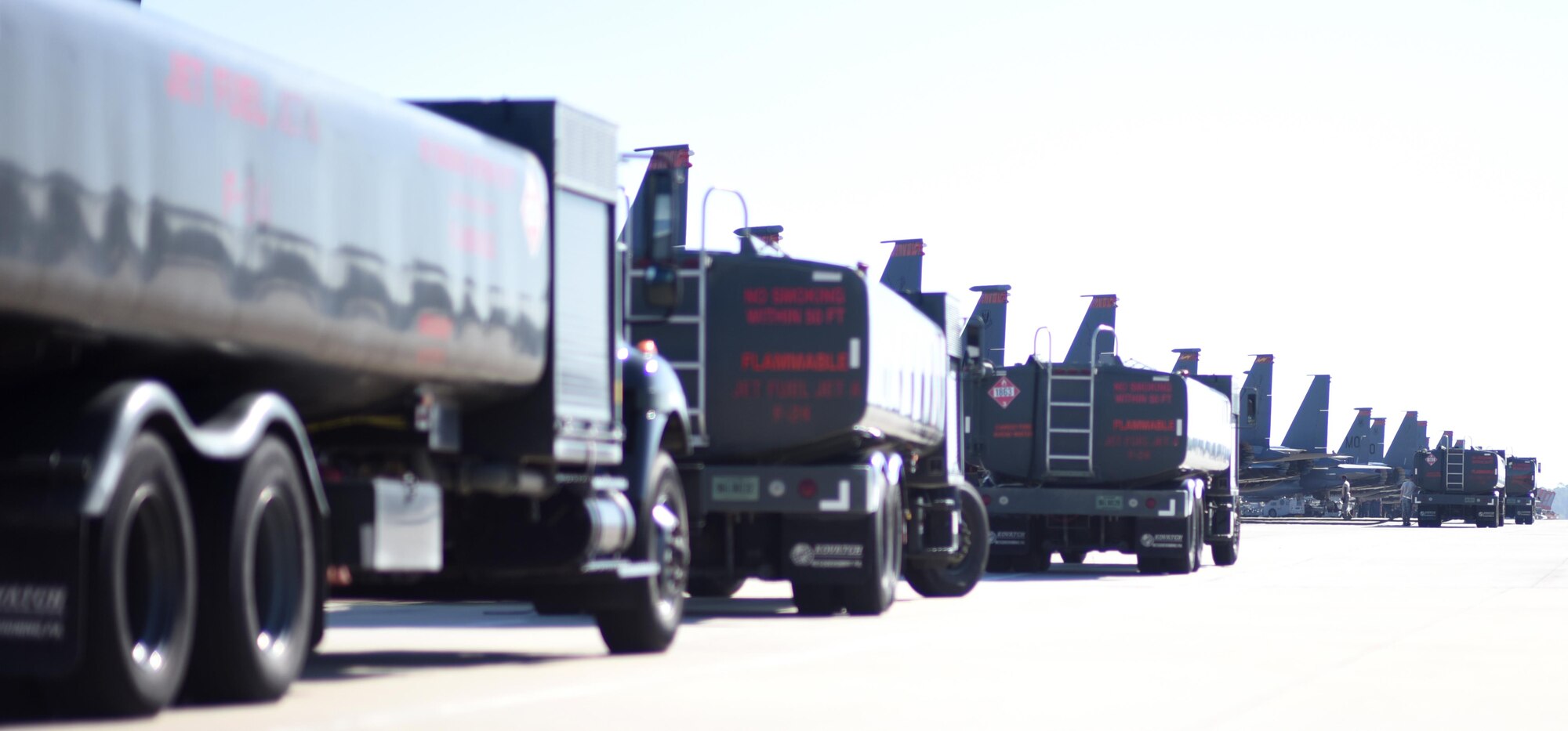 A line of U.S. Air Force Type-A Jet Fuel trucks sit on the flightline at Tyndall Air Force Base, Fla., during Checkered Flag 17-1 andCombat Archer 17-3 Dec. 13, 2016. More than 90 aircraftparticipated during the concurrent exercises and were fueled with a total of 1.84 million gallons of aircraft fuel by the 325th Logistics Readiness Squadron and other logistics readiness squadrons   over the span of two weeks. (U.S. Air Force photo by Senior Airman Solomon Cook/Released)