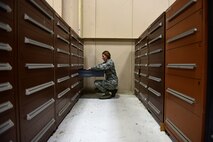 Airman 1st Class Rebecca Nunez, an Aircraft Parts Store technician assigned to the 28th Logistics Readiness Squadron, organizes a cabinet of aircraft parts in the aircraft parts store at Ellsworth Air Force Base S.D., Dec. 7, 2016. The aircraft parts store has more than 35,000 assets to ensure maintenance can get the right part as quickly as possible. (U.S. Air Force photo by Airman 1st Class James L. Miller)  