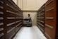 Airman 1st Class Rebecca Nunez, an Aircraft Parts Store technician assigned to the 28th Logistics Readiness Squadron, organizes a cabinet of aircraft parts in the aircraft parts store at Ellsworth Air Force Base S.D., Dec. 7, 2016. The aircraft parts store has more than 35,000 assets to ensure maintenance can get the right part as quickly as possible. (U.S. Air Force photo by Airman 1st Class James L. Miller)  