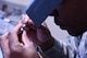 Staff Sgt. Khodie Morgan, 341st Medical Operations Squadron dental laboratory technician, refines a working die to make a crown in the dental laboratory Dec. 5, 2016, at Malmstrom Air Force Base Mont. When a cast is sectioned off into parts, each part is then referred to as a die. (U.S. Air Force photo/Senior Airman Jaeda Tookes)