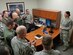 Col. Jimmy Canlas, 437th Airlift Wing commander and several Chief Master Sergeants from Joint Base Charleston congratulate Senior Master Sgt. Emily Edmunds, 437th Operations Support Squadron superintendent, on her selection to Chief Master Sgt. at the 437th Operations Group building here Dec. 15, 2016. Edmunds is the only Senior Master Sgt. to be selected here and will be promoted to Chief Master Sgt. in Dec. 2017.