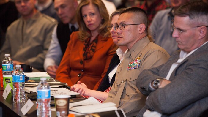Brig. Gen. William Seely III, the Director of Intelligence at Headquarters Marine Corps, evaluates a demonstration given by members of the Marine Corps Intelligence, Surveillance, and Reconnaissance Enterprise Accelerator Program at Stafford, Virginia, Dec. 9. Helios, the technology developed during the program, is designed to keep request for intelligence (RFI) customers informed throughout the production process. The demonstration is the culmination of 12 weeks of design and development for Helios.