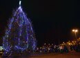 Team BLAZE families watch as the lights on the Christmas tree in front of the base chapel is lit up Dec. 13, 2016, at Columbus Air Force Base, Mississippi. The evening began at Base Ops where Santa arrived via a T-1A Jayhawk aircraft and rode in a firetruck to the Base Chapel, where he watched the tree lighting. Afterward, Santa took pictures with children in the Kaye Auditorium. (U.S. Air Force photo by Senior Airman John Day)