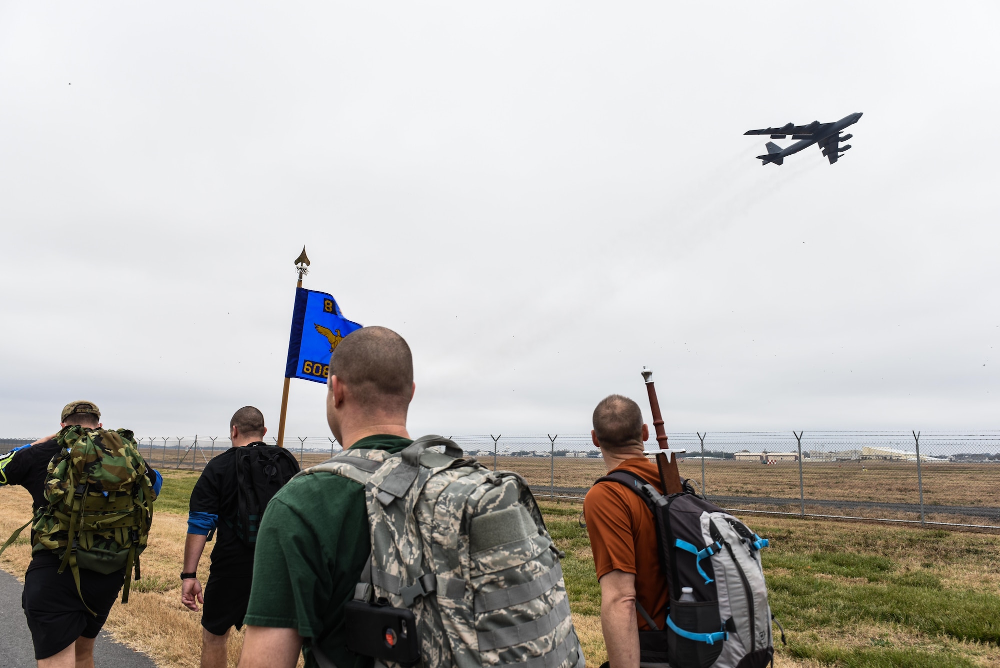 Airmen assigned to the 608th Air Operations Center participate in a ruck march as part of a fitness program capstone event at Barksdale Air Force Base, La., Dec. 12, 2016. The 608th AOC Commander’s Advanced PT Program requires participants to complete 3,000 push-ups, 3,000 sit-ups, run/walk 120 miles and complete a 6.08 mile ruck march within a 90-day-period to earn their name on an ingot attached to the unit’s fitness plaque. (U.S. Air Force photo by Senior Airman Luke Hill)