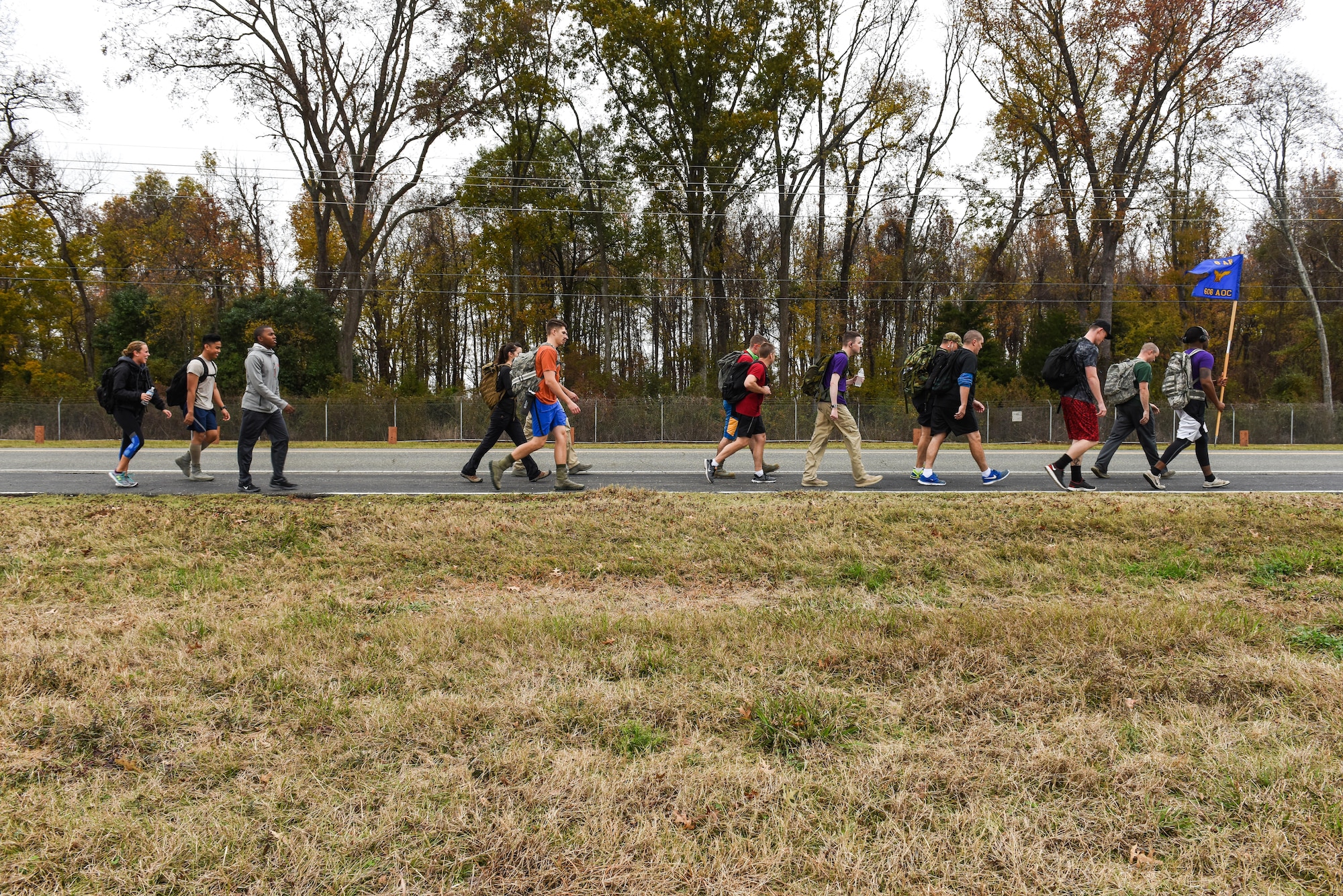 Airmen assigned to the 608th Air Operations Center participate in a ruck march as part of a fitness program capstone event at Barksdale Air Force Base, La., Dec. 12, 2016. The advanced PT program is intended to encourage habitual fitness, boost morale and serve as an initiative to seeking out new fitness regimes. (U.S. Air Force photo by Senior Airman Luke Hill) 