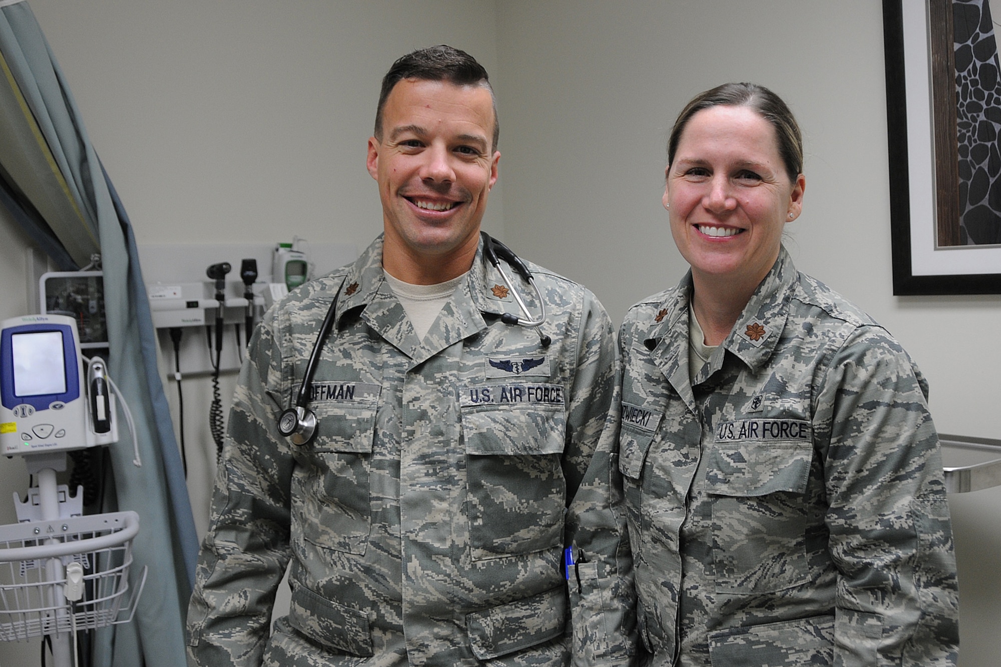 Maj. Zach Hoffman and Maj. Kelly Niedzwiecki, Virginia Air National Guard – 192nd Medical Group, help with a rescue in a motor vehicle rollover in Hampton, Virginia, Nov. 19, 2016.