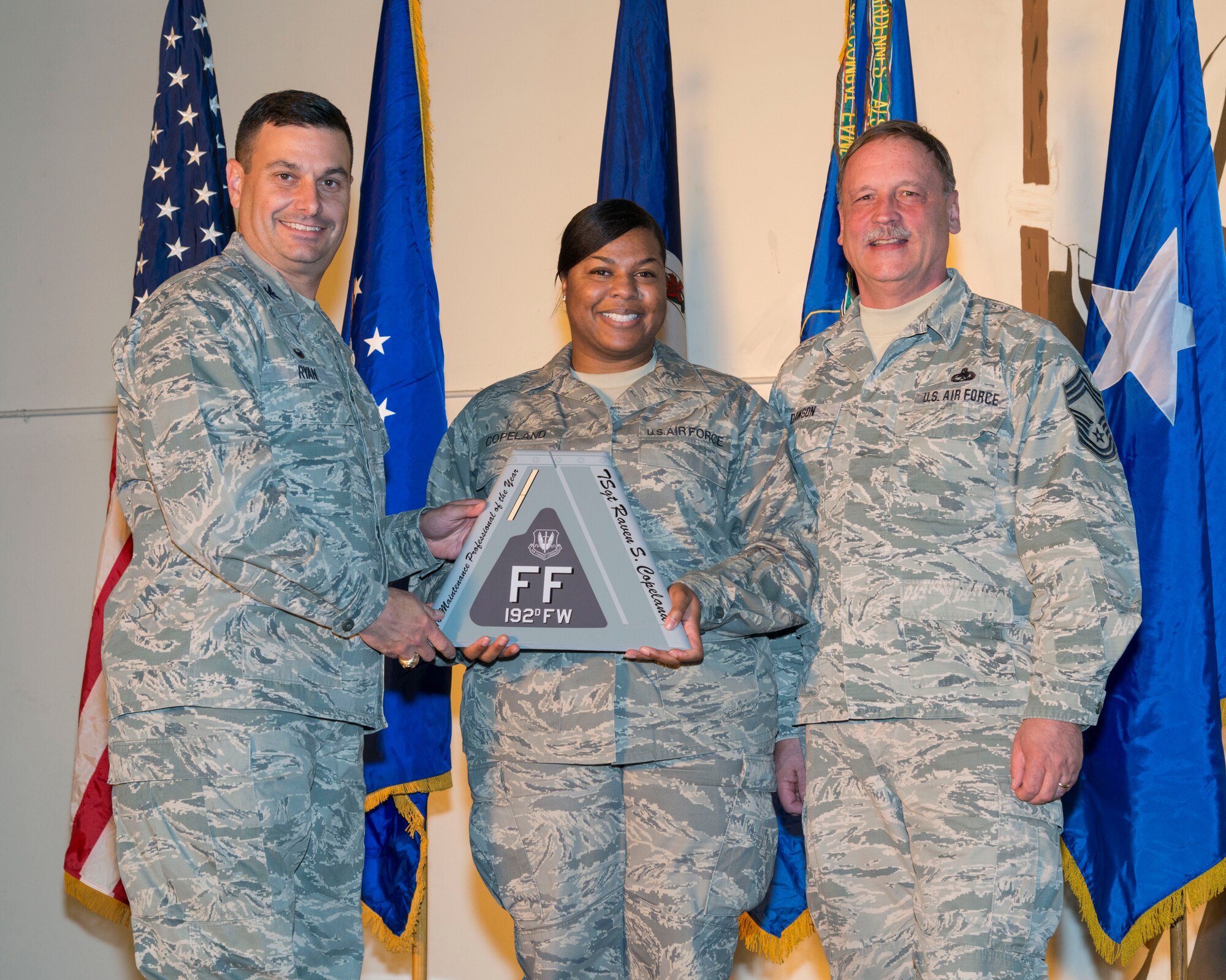 The 192nd Fighter Wing honors the achievements of its members during the fifth annual holiday awards banquet at Joint Base Langley-Eustis, Virginia, Dec. 10, 2016.  Airmen from Wing Staff, Maintenance, Medical, Mission Support and Operations Group were recognized for their outstanding efforts in 2016. U.S. Air National Guard photo by Senior Airman Kellyann Novak)