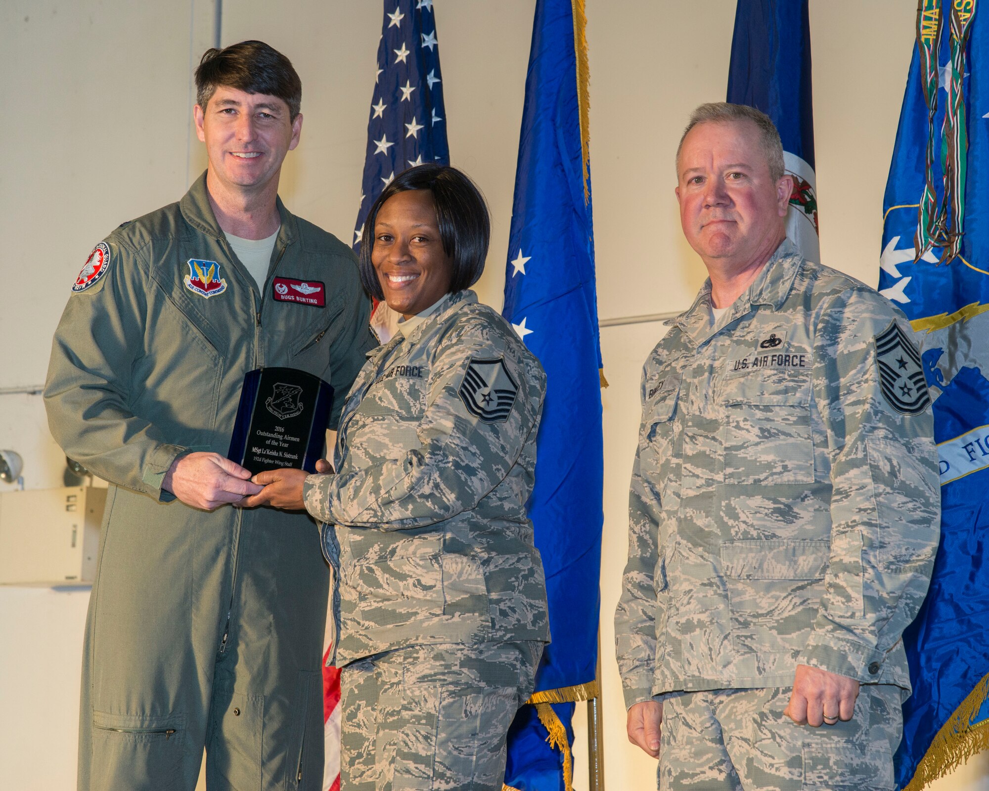 The 192nd Fighter Wing honors the achievements of its members during the fifth annual holiday awards banquet at Joint Base Langley-Eustis, Virginia, Dec. 10, 2016.  Airmen from Wing Staff, Maintenance, Medical, Mission Support and Operations Group were recognized for their outstanding efforts in 2016. U.S. Air National Guard photo by Senior Airman Kellyann Novak)