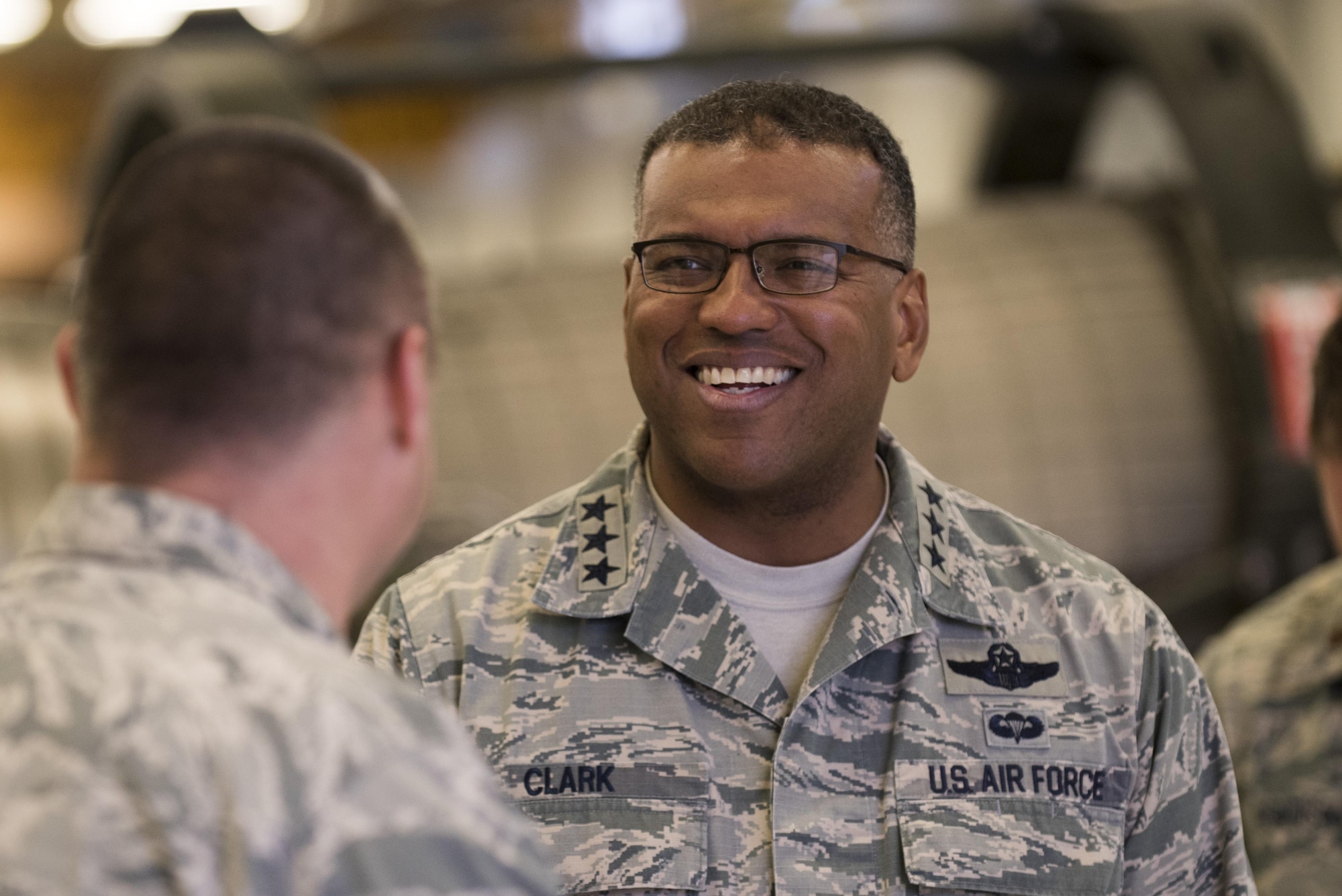 U.S. Air Force Lt. Gen. Richard M. Clark, 3rd Air Force and 17th Expeditionary Air Force commander, smiles during a base familiarization tour at Spangdahlem Air Base, Dec. 14, 2016. His tour included a breakfast and lunch with outstanding performers, a brief about the wing’s accomplishments, a sneak peek at base renovations and an all call with nearly 500 Airmen. (U.S. Air Force photo by Airman 1st Class Preston Cherry)