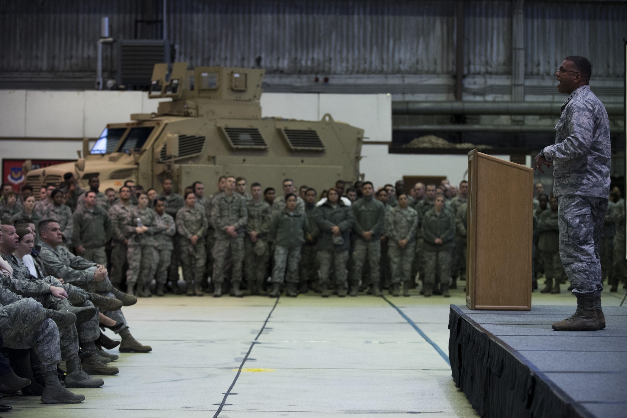 U.S. Air Force Lt. Gen. Richard Clark, 3rd Air Force and 17th Expeditionary Air Force commander, speaks at an all call during a base familiarization tour at Hangar One on Spangdahlem Air Base, Dec. 14, 2016. Clark talked to the wing about his three main priorities: the importance of mission, inspiring Airmen and making time for family. (U.S. Air Force photo by Airman 1st Class Preston Cherry)