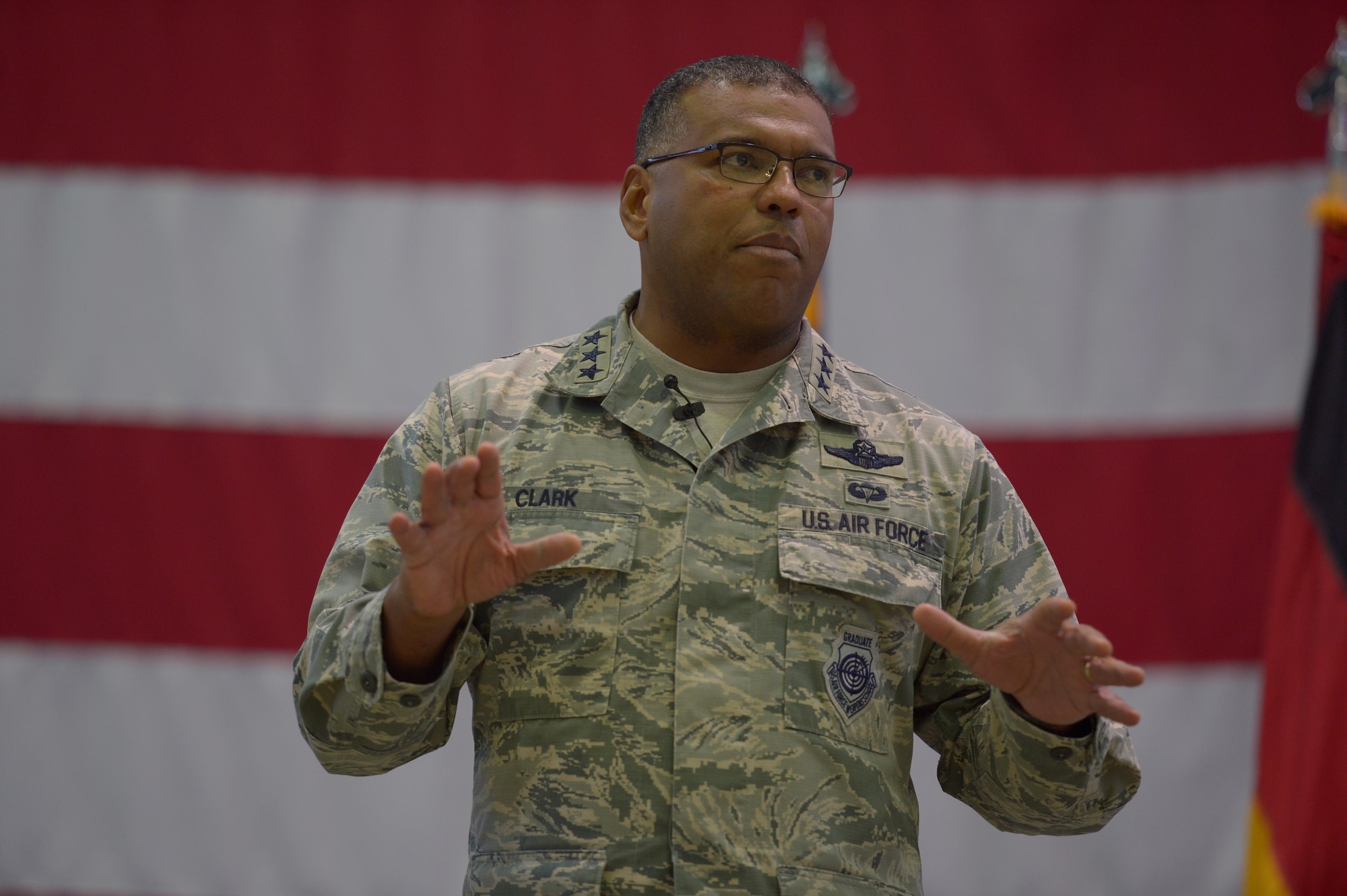 Lt. Gen. Richard Clark, 3rd Air Force and 17th Expeditionary Air Force commander, talks about his priorities during an all call at Hangar One on Spangdahlem Air Base, Germany, Dec. 14, 2016. This visit represented his first time at Spangdahlem Air Base since assuming command in October 2016. (U.S. Air Force photo by Staff Sgt. Jonathan Snyder)