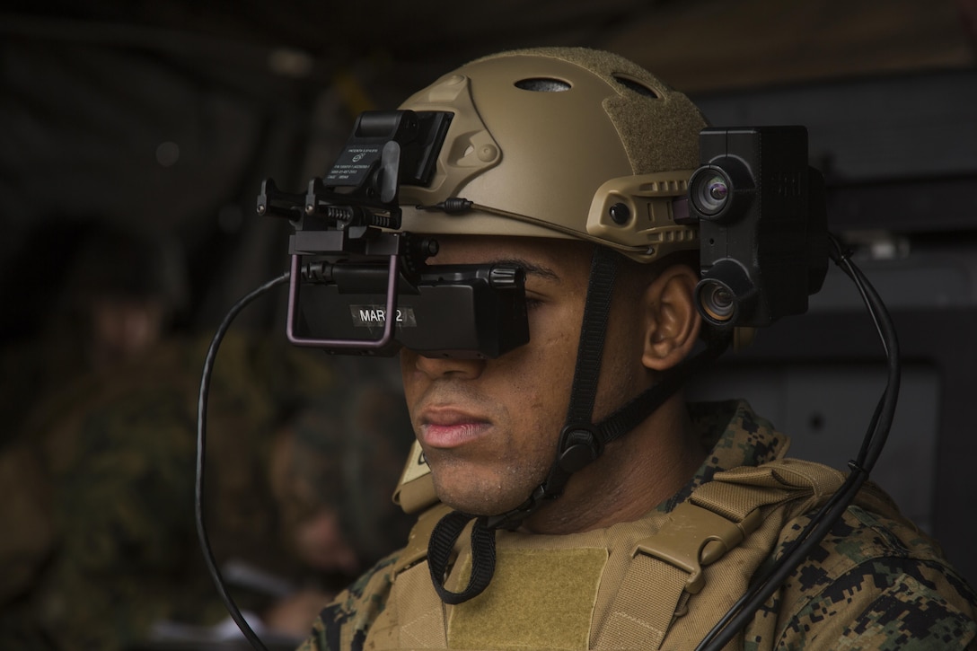 Lance Cpl. Jorge Brito uses the Augmented Immersive Team Trainer to locate virtual enemy tanks at Camp Lejeune, N.C., Dec. 13, 2016. The AITT is designed to be cost-effective by replacing actual training targets with virtual moving targets. Brito is a fire support Marine with 2nd Battalion, 10th Marine Regiment, 2nd Marine Division. (U.S Marine Corps photo by Lance Cpl. Juan A. Soto-Delgado)