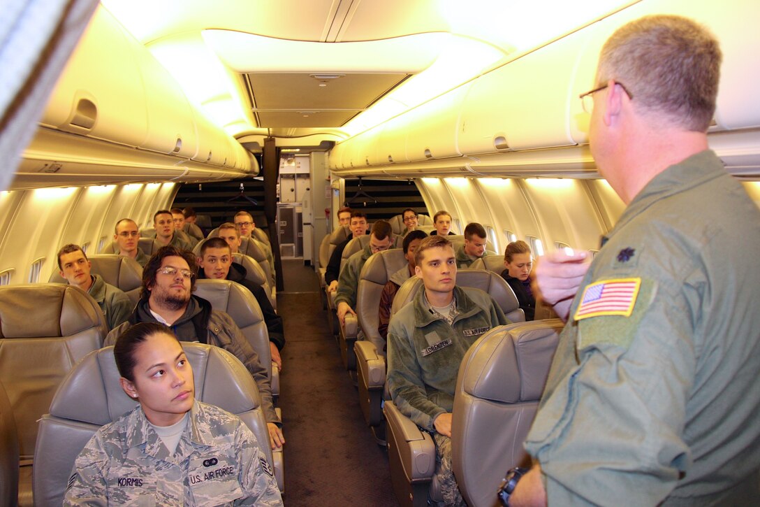 Lt. Col. Mike Maloney, a C-40C pilot with the 932nd Airlift Wing, tells intrigued college Reserve Officer Training Corps cadets about his many flying experiences during a community relations project at the Illinois unit which is located at Scott Air Force Base, Illinois.  The 932nd is the only Air Force Reserve Command wing flying the C-40C and falls under 22nd Air Force.  Students were able to see the maintenance area and meet members of the aircrew.  (U.S. Air Force photo by Lt. Col. Stan Paregien)