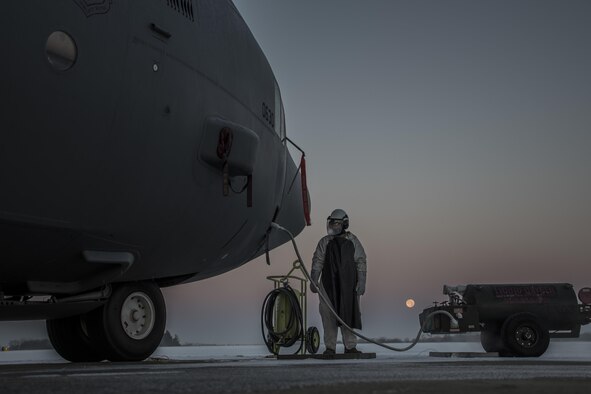 Tech. Sgt. Jordan Brown refills a C-130H Hercules with liquid oxygen on the flightline of the 179th Airlift Wing in Mansfield, Ohio, Dec. 14, 2016. The 179th AW is always on a mission to be the first choice to respond to state and federal missions. (U.S. Air National Guard photo/Tech. Sgt. Joe Harwood)