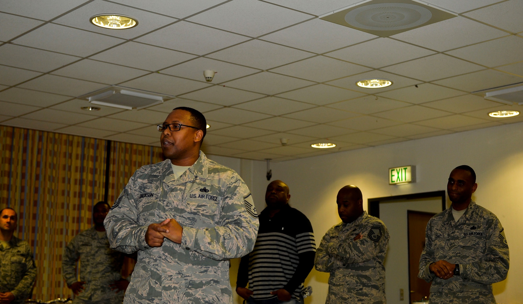 Master Sgt. Erroll Jackson, 86th Force Support Squadron career assistance advisor, speaks about mentorship during a Huddle meeting at Ramstein Air Base, Germany, Dec. 13, 2016. The Huddle is a club which provides an avenue for NCOs, senior NCOs, and junior enlisted Airmen to have open and constructive dialogue concerning issues such as mentorship and work life. (U.S. Air Force photo by Airman 1st Class Joshua Magbanua)