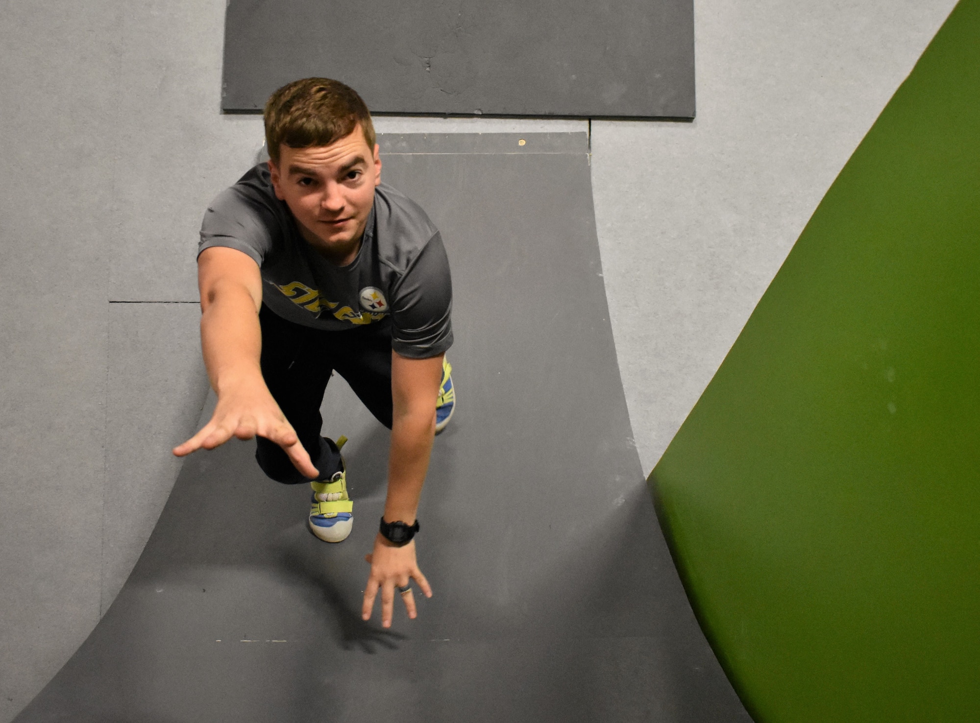 An Airman participates in a Ninja Warrior activity as part of resiliency building in the T.H.R.I.V.E Program.